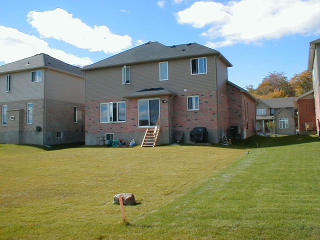 Oct 9, 2004 - The backyard..needs a deck eh!