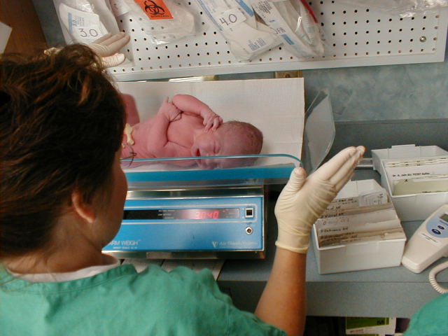 Ben getting weighed 3.04 kgs