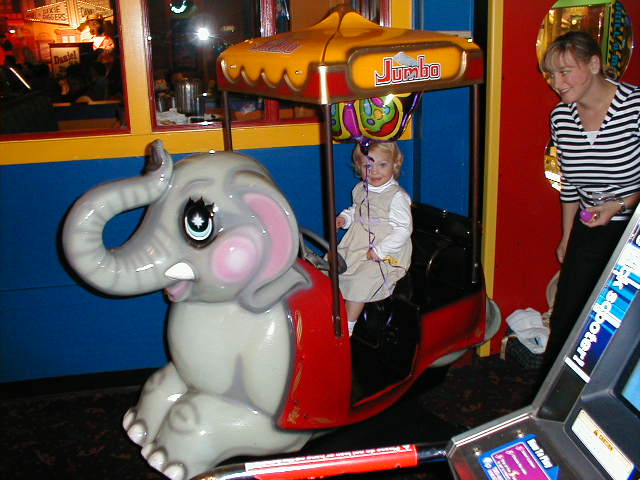 Leila rides the elephant